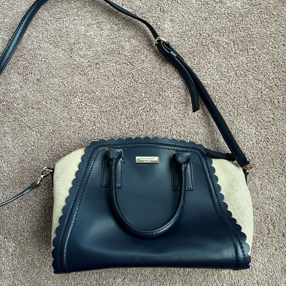 Gently used Kate Spade leather and canvas bag with scalloped edges
